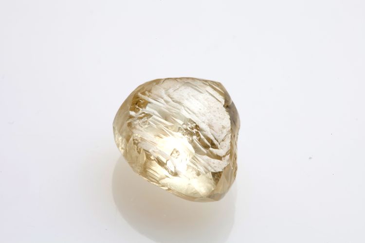 The 6.15-carat rough to 4.06-carat heart-shaped Honey diamond (below) cut by Herman Wynens for Langerman Diamonds.
