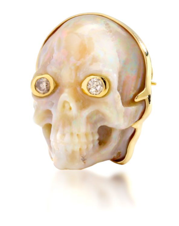 Syna skull brooch in 18-karat gold with diamonds and carved Ethiopian opal.