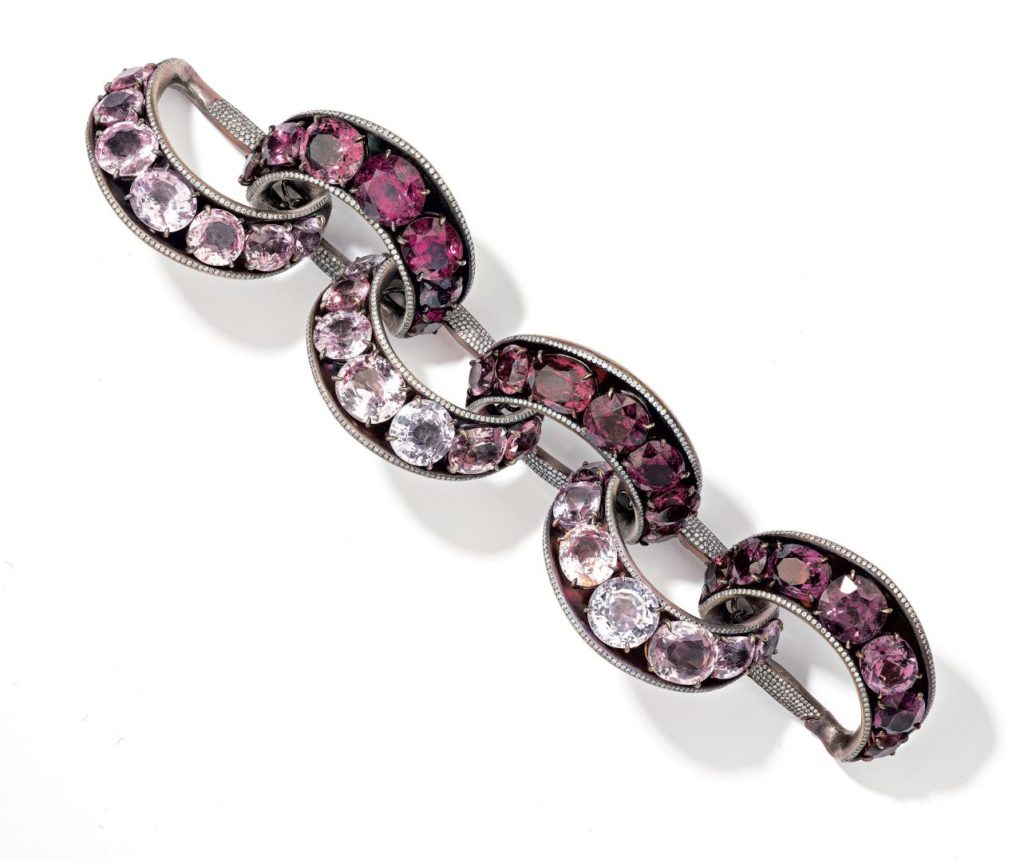 A linked titanium bracelet featuring 42 “unheated” natural shades of oval-shaped purple spinels. Photo: Adam Norton at Jak Jaes Ltd. 