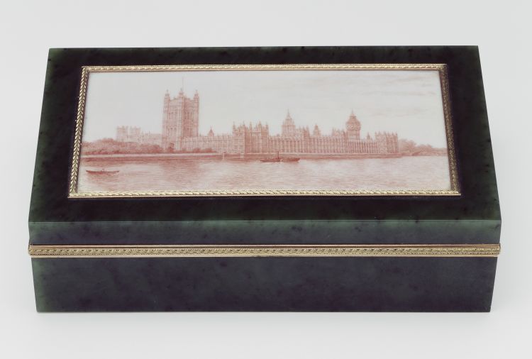 Cigar Box with a view of the Houses of Parliament, Fabergé. Chief Workmaster Henrik Wigstrom, nephrite, two-colour gold, sepia enamel, 1908. Royal Collection Trust © Her Majesty Queen Elizabeth II 2021