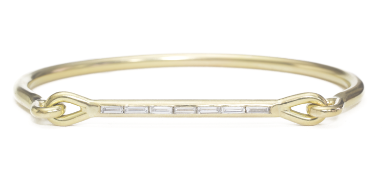 Solid cuff in 18-karat recycled gold with 0.35 carats of baguette diamonds. Photo: Tura Sugden.