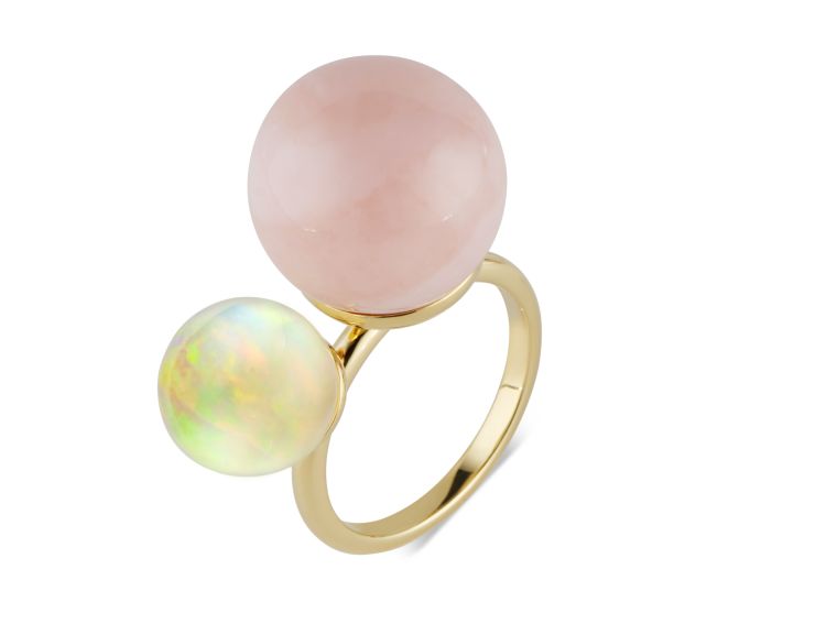 Akaila Reid Ethiopian and Pink Opal ring in 18-karat yellow gold with a 23.10-carat pink opal and a 6.90-carat Ethiopian opal. 