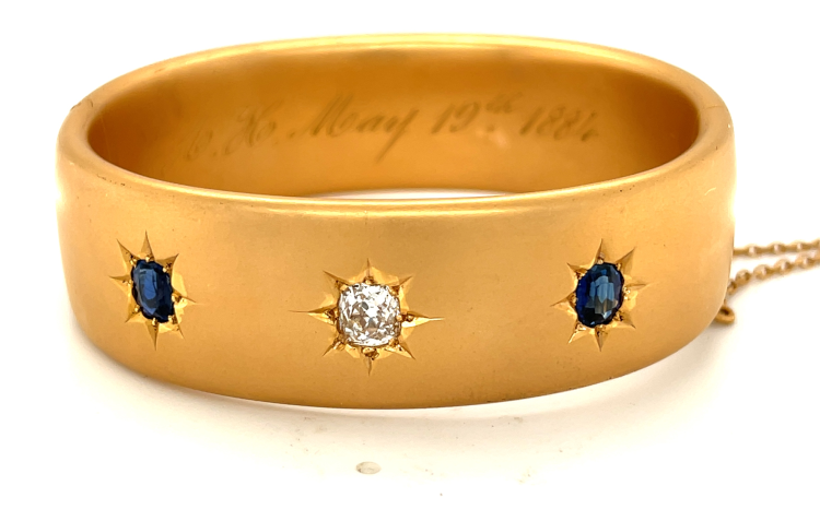 Keyamour Victorian bangle, with sapphire and diamond accents, in 18-karat yellow gold. Photo: Keyamour.