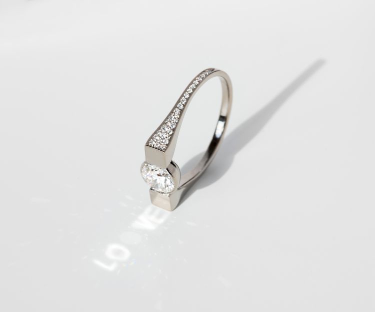 The Rayy Solitaire ring in 18-karat gold and lab-grown diamonds, featuring a hidden “Love” message.