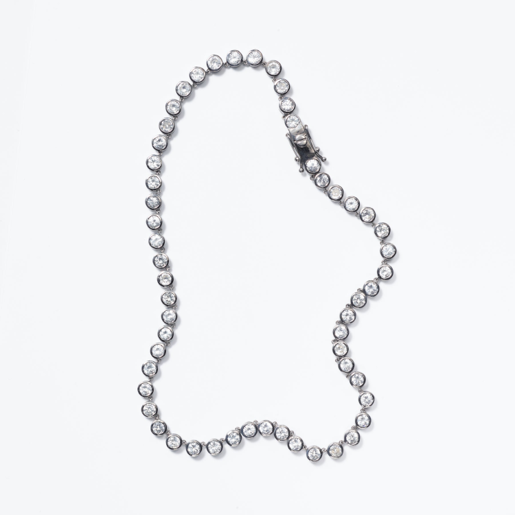 Nakard sterling silver and black rhodium Small Dot necklace, with white zircon. Photo: Nak Armstrong.