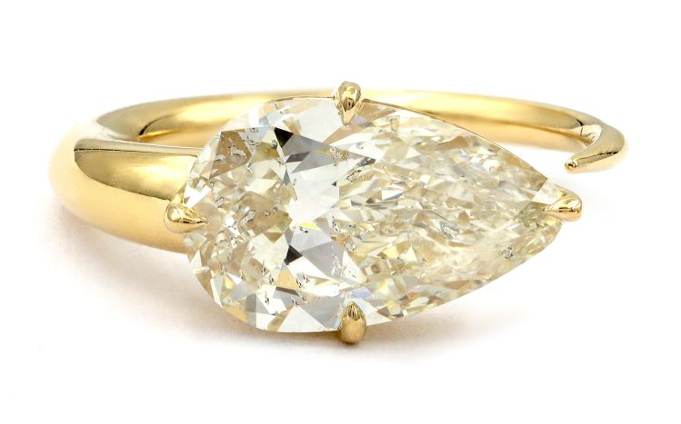 Sofia Kaman Sloane sideways ring with a pear-cut, 3.03-carat antique diamond in 18-karat gold. 
