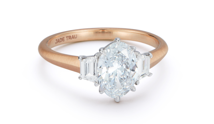 Jade Trau Jenny three-stone ring in 18-karat gold with an oval, 1.11-carat diamond and two trapezoid, 0.15-carat side diamonds. Photo: Jade Trau.