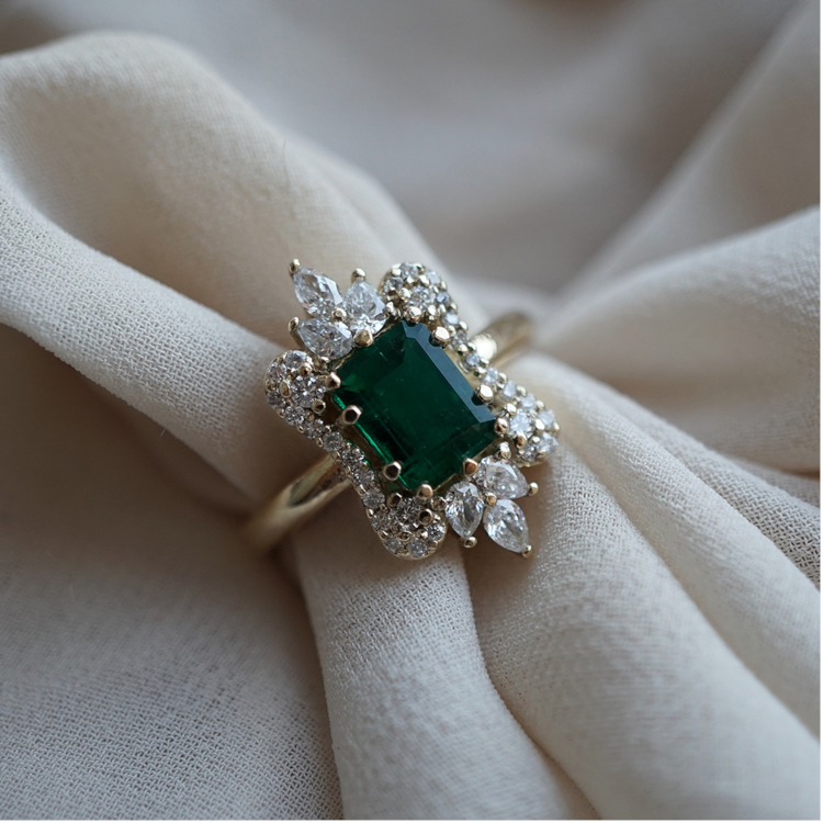 Tippy Taste Eleanor ring in 14-karat gold with an emerald, six pear-shape diamonds totaling 0.76 carats and 0.25 carats of round diamonds. Photo: Tippy Taste.