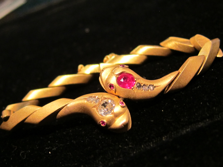 Double snake bracelet in 18-karat gold, with ruby and diamonds, c. 1890. Photo: Beverly R Jewelry. 