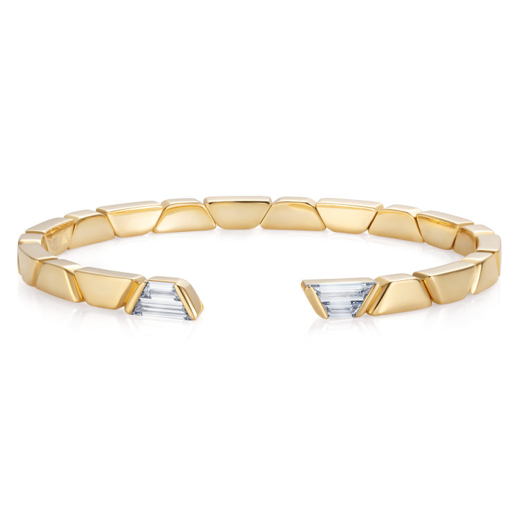 Thelma West Embrace bangle with trapezoid-cut diamonds in 18-karat recycled yellow gold. (Thelma West)