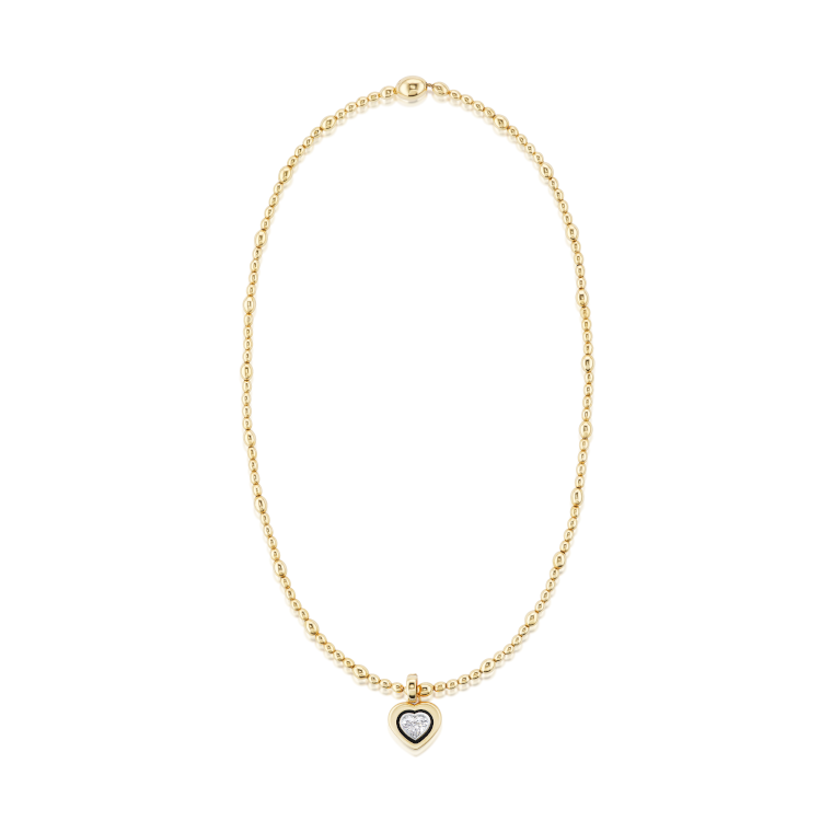Signature gold necklace set with a heart-shaped diamond. (Anne Baker)