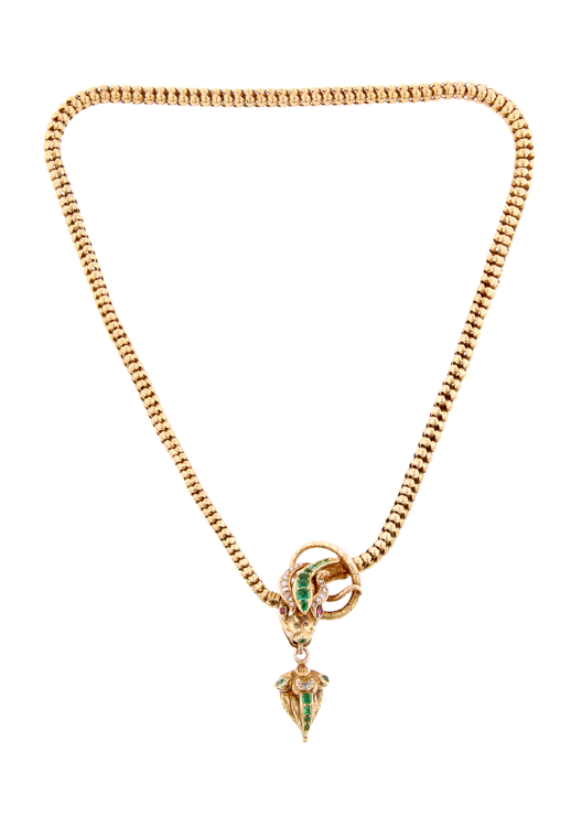 Victorian snake pendant in 14-karat yellow gold with locket-back set with emerald, round and pear cut emeralds, rose cut diamonds and ruby eyes, circa 1870. (Doyle & Doyle)