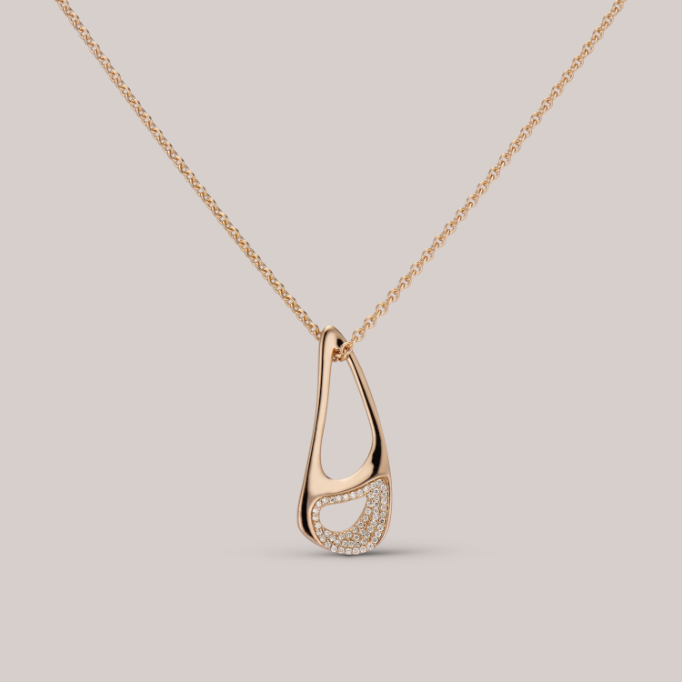 Tear Balance necklace in 18-karat yellow gold with 0.8 carats of champagne diamonds on a thick chain. (JV Insardi)