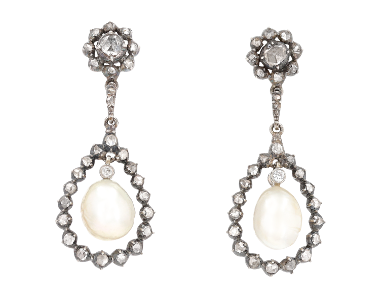 A pair of Victorian earrings in silver and 12-karat gold with natural pearls and diamonds. (M. S. Rau)
