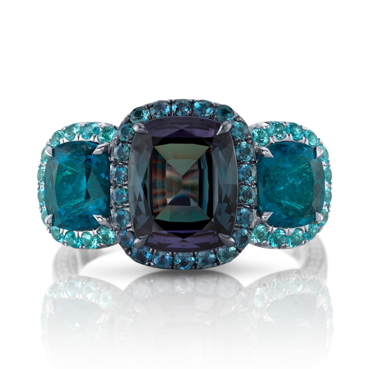 Platinum ring accented with black rhodium, featuring a 2.67-carat cushion alexandrite and accented by 2.09 carats of cushion Paraíba tourmalines, 0.34 carats of round alexandrites, 0.26 carats of round Paraíba tourmalines and 0.78 carats of round diamonds. (Omi Privé)