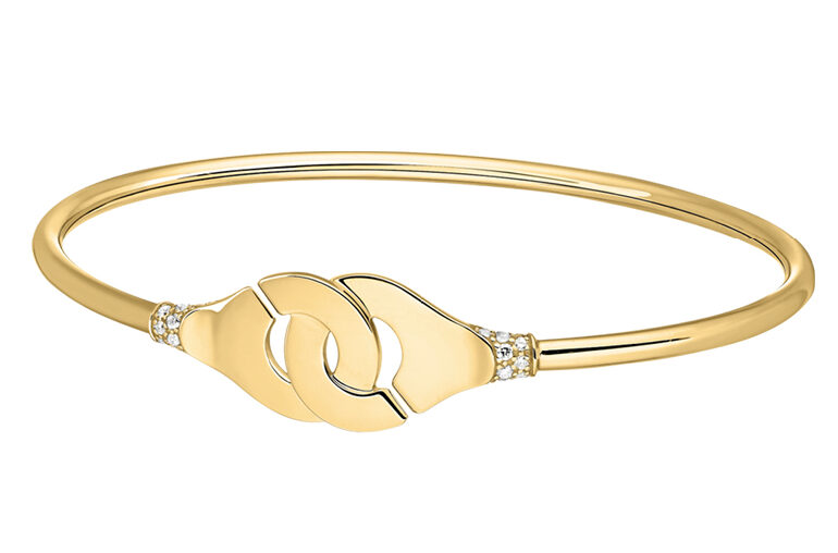 Menottes bracelet in 18-karat yellow gold with diamonds. (Dinh Van)