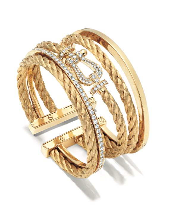 Fred Force 10 cuff set in yellow gold with diamonds. (Fred)