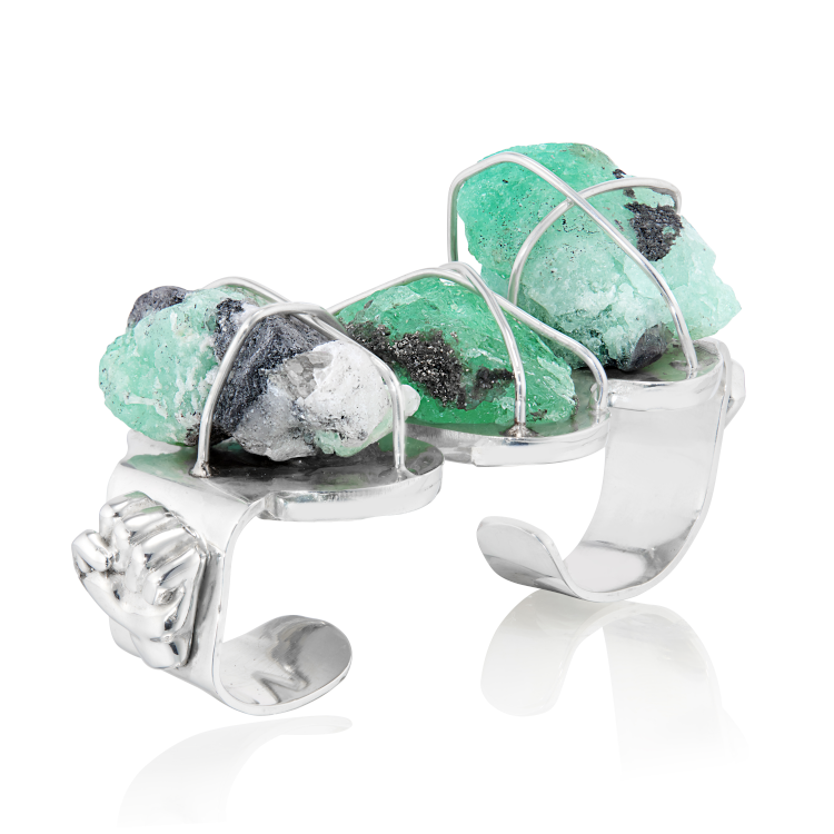 All Power Fist four-finger ring, in sterling silver, featuring 189 carats of rough-cut Muzo emeralds, by Johnny Nelson Jewelry. (Johnny Nelson)