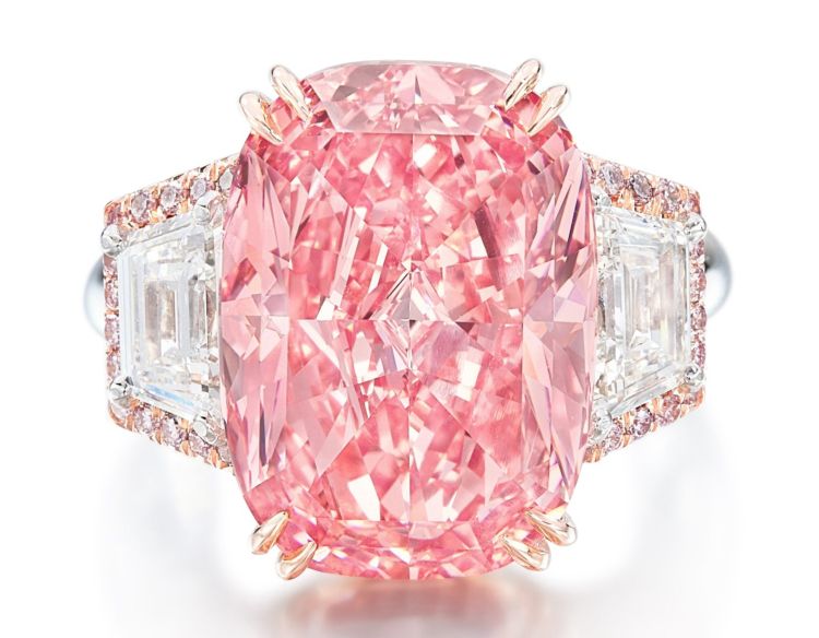 Frenzied bidding took the price of the fancy vivid pink “Williamson Pink Star” to $57.7 million, the record price per carat for any gemstone, at Sotheby’s in Hong Kong. (Sotheby’s) 