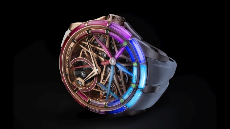 Roger Dubuis EON gold case and bezel set with curved synthetic sapphires in gradient hues with luminescence EON gold* crown Sapphire crystal (Roger Dubuis)
