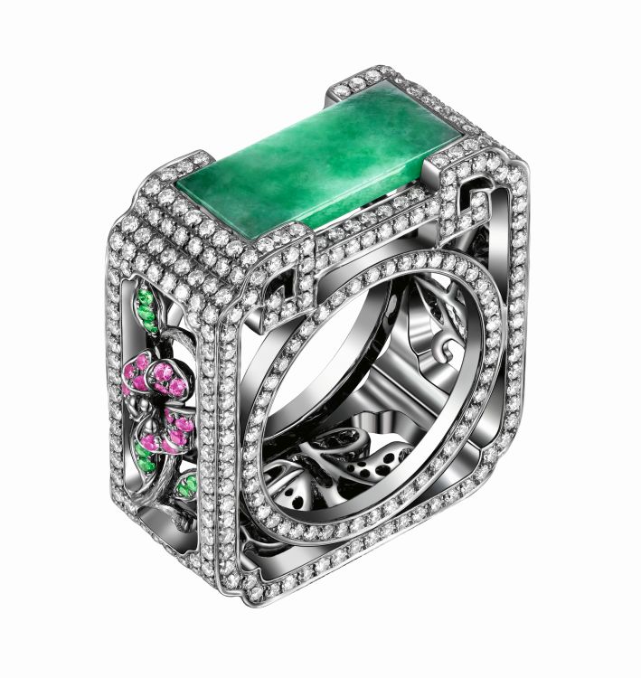 Yewn Floral lattice moon gate ring with jadeite, diamond, pink sapphire, tsavorite garnet and black rhodium-plated gold. (ACC Art Books)  