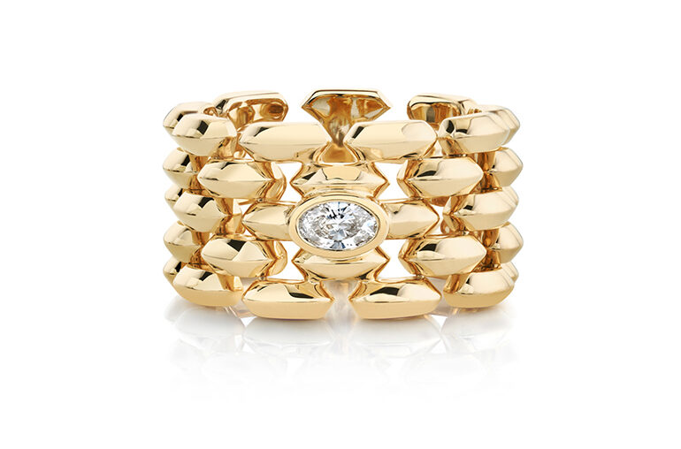 Lizzie Mandler 18k gold five row Cleo ring with an oval white diamond in the center