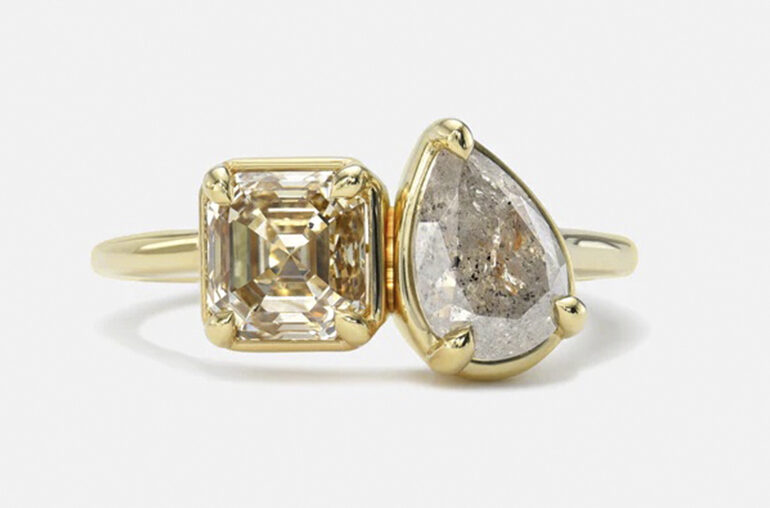 Maggie Simpkins one-of-a-kind "Toi et Moi" style ring featuring one 1.25-cara champagne color Asscher cut natural diamond and one 1.15-carat grey salt and pepper pear-shape natural diamond