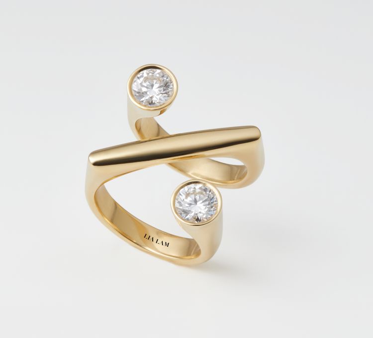 100% ring in 18-karat yellow gold with diamonds. (Lia Lam)