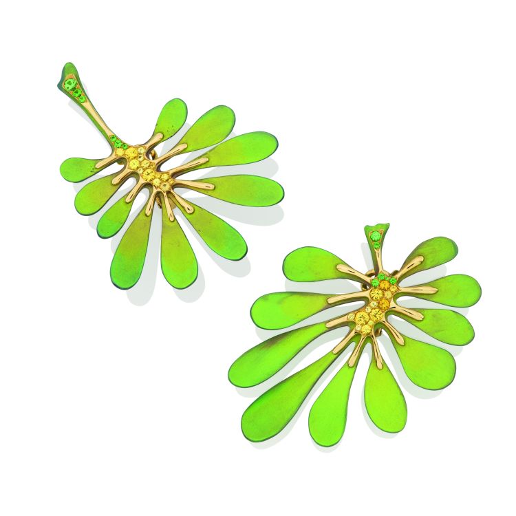 Leaves earrings set with tsavorite garnets and yellow sapphires, set in 18-karat recycled yellow gold and anodized titanium. (Maison Alix Dumas)