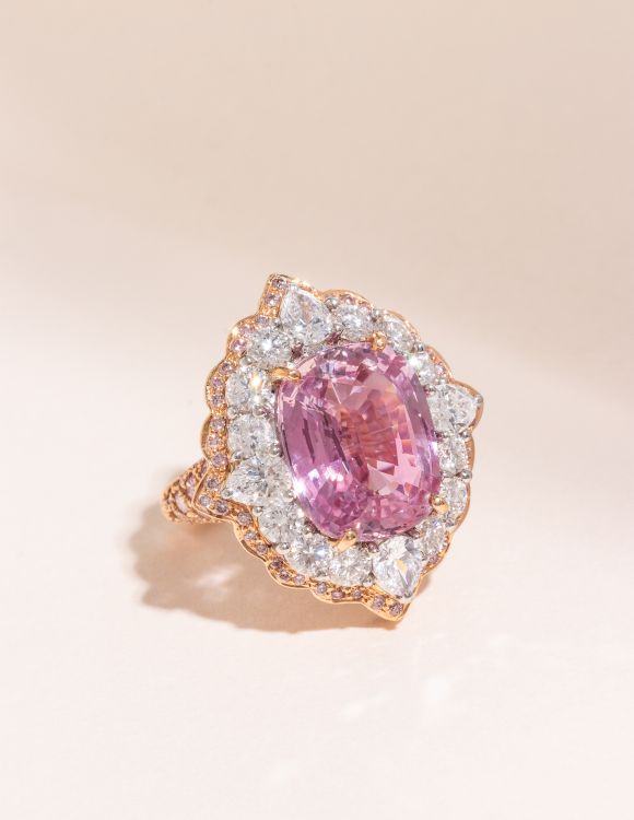 Padparadscha sapphire, pink diamond and diamond ring sold for $150,000 at Hindman. (Hindman)