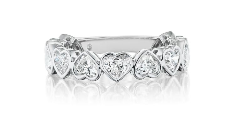 Serpentine Jewels eternity band in 18-karat white gold with bezel-set heart-shaped diamonds. (Serpentine Jewels)