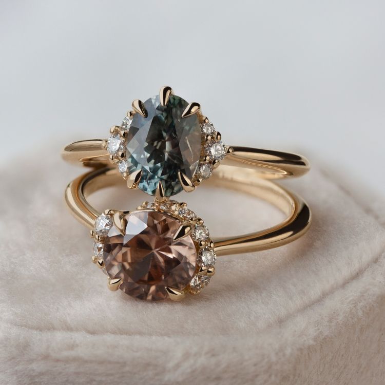 Emily Chelsea Jewelry rings: Montana sapphire and diamond cluster ring and Australian zircon and diamond ring. (Emily Chelsea Jewelry)