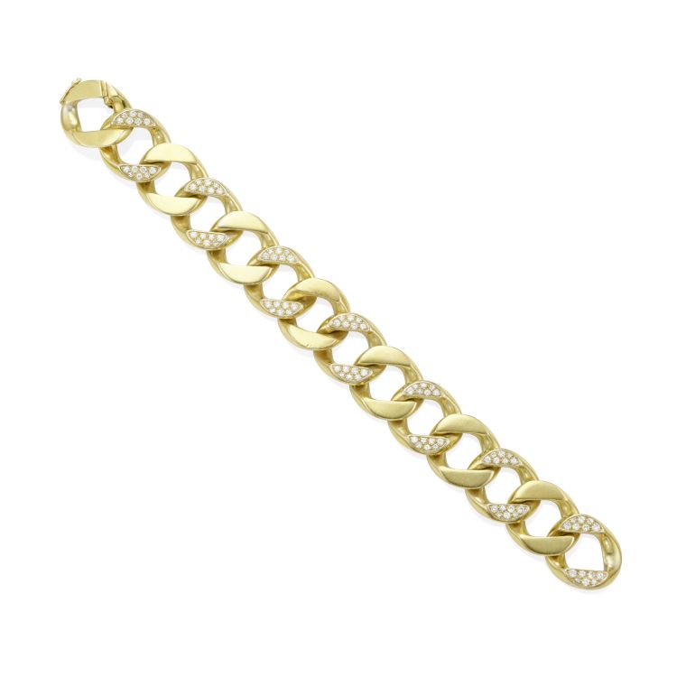 A curb-link bracelet in 14-karat gold and diamond. (Bonhams)
