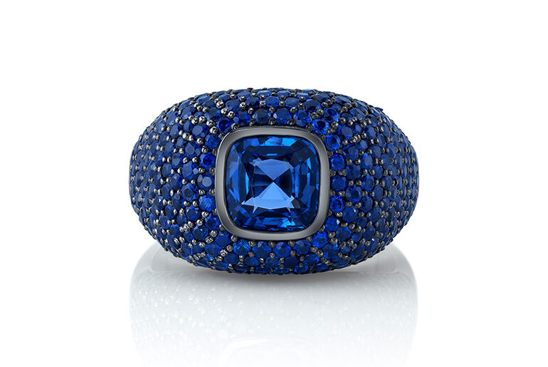 Omi Privé Platinum men’s ring with black rhodium accents, featuring a cushion-cut, 2.07-carat, cobalt-blue spinel and 228 blue sapphires.