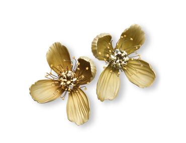 Hemmerle flower earrings created from fancy dark brown-yellow and fancy brownish greenish- yellow diamonds each over 6 carats set in aluminum with green gold and white gold.