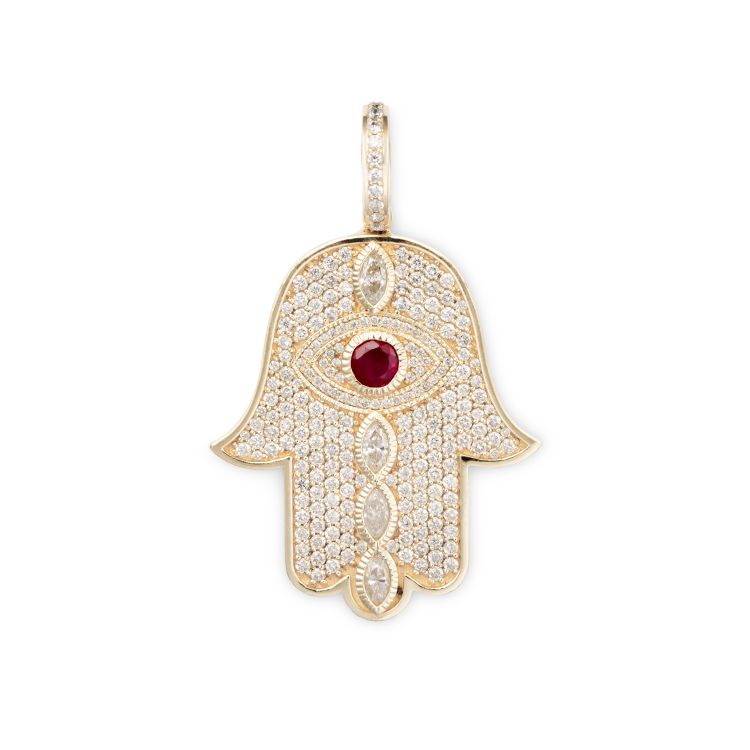 Large hamsa charm set with a ruby, marquise diamonds and diamonds. (Jacquie Aiche)
